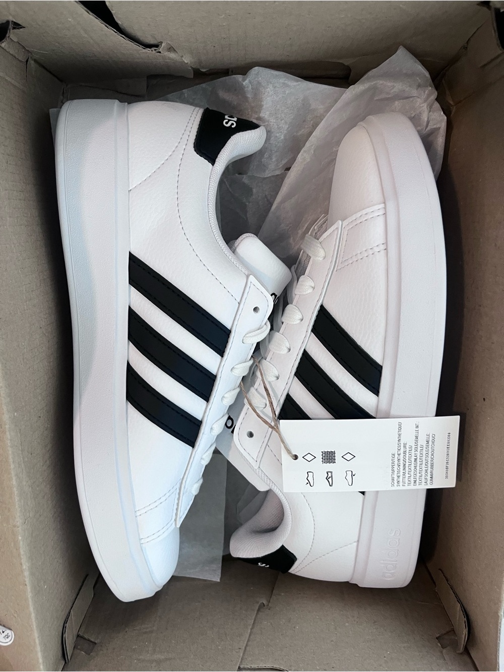 adidas Women’s White Sneakers with Black Stripes